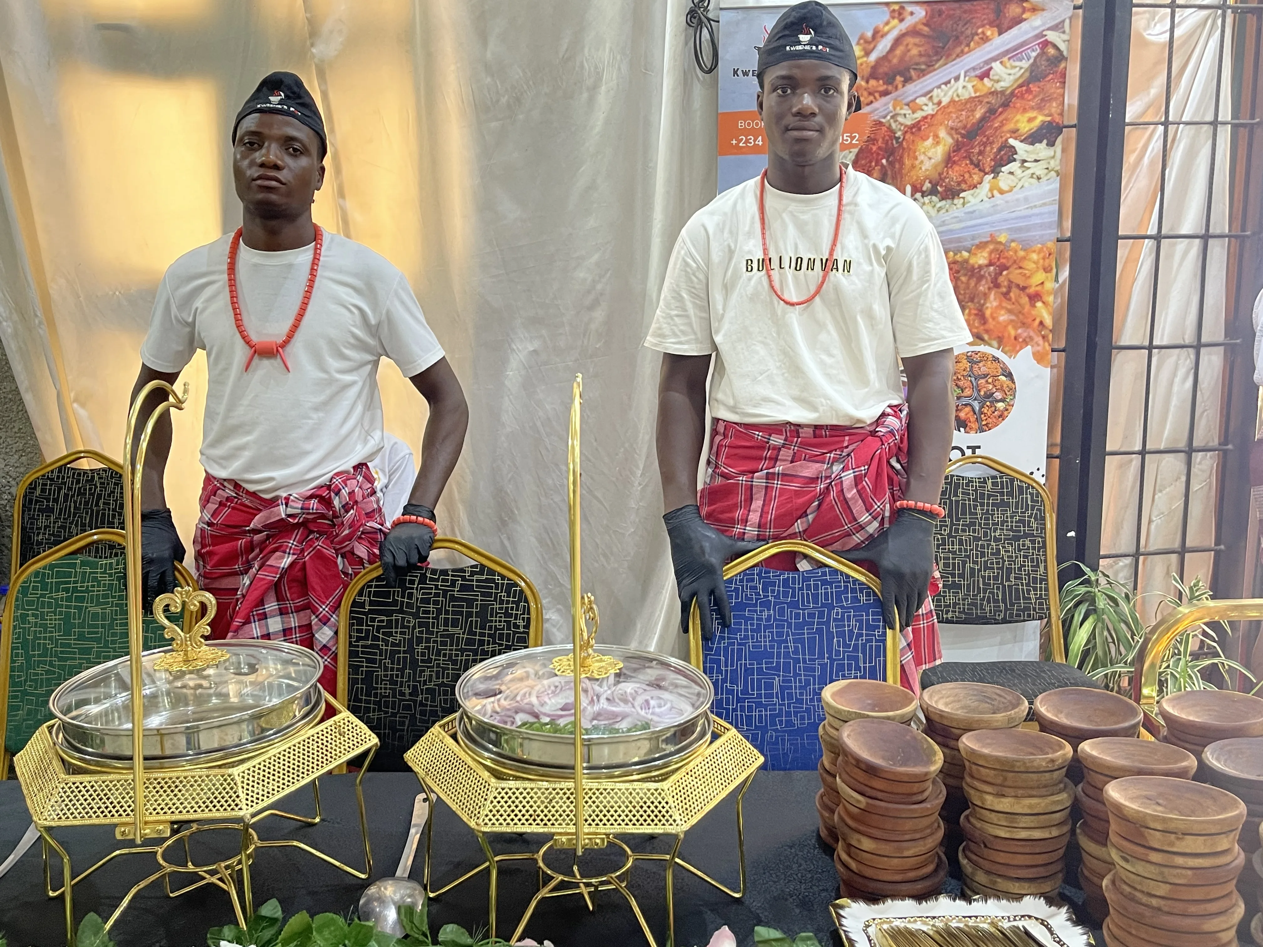Professional catering staff at an event food station