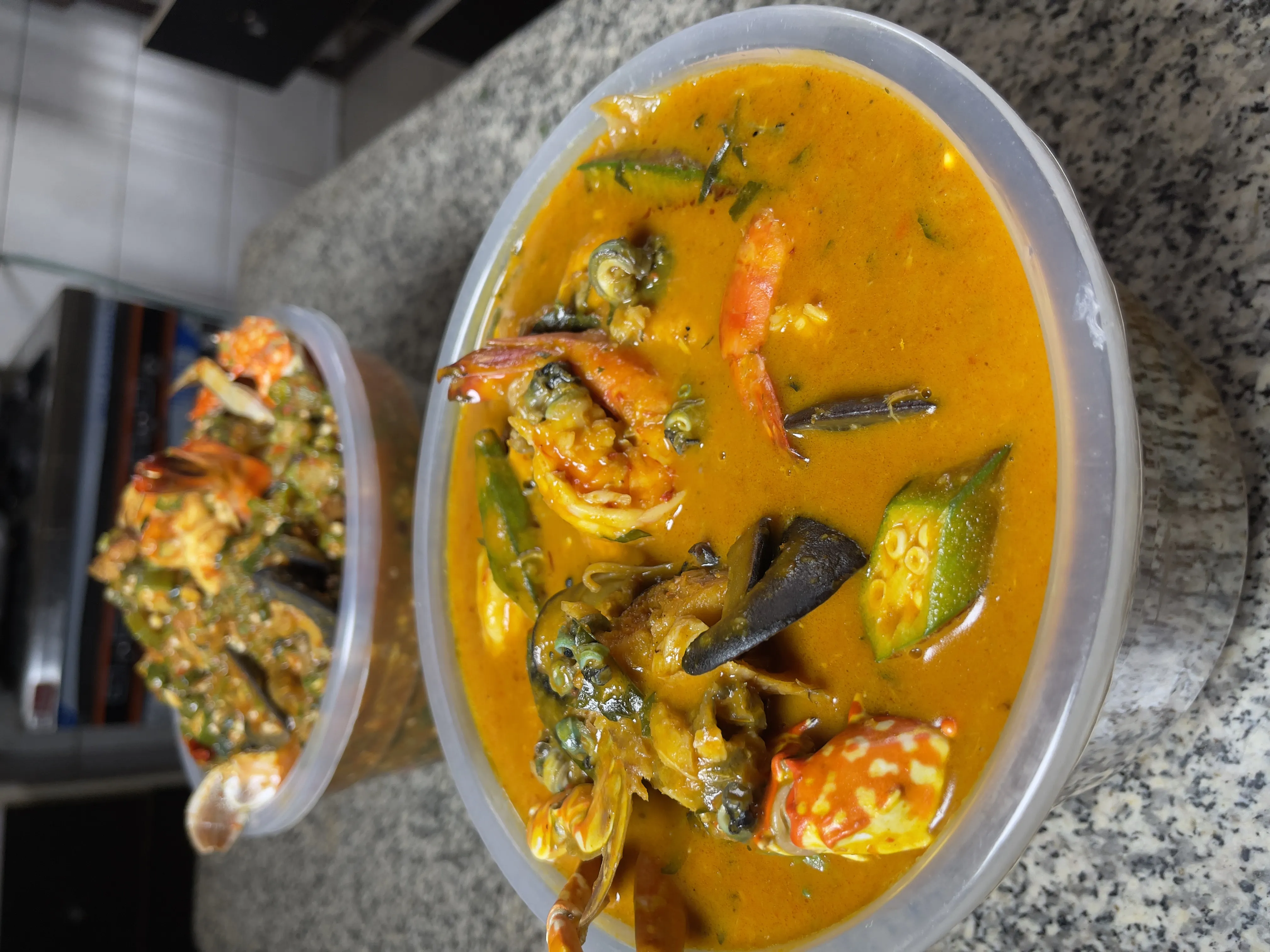 Fisherman soup with fresh prawns, fish, and periwinkle in aromatic pepper broth